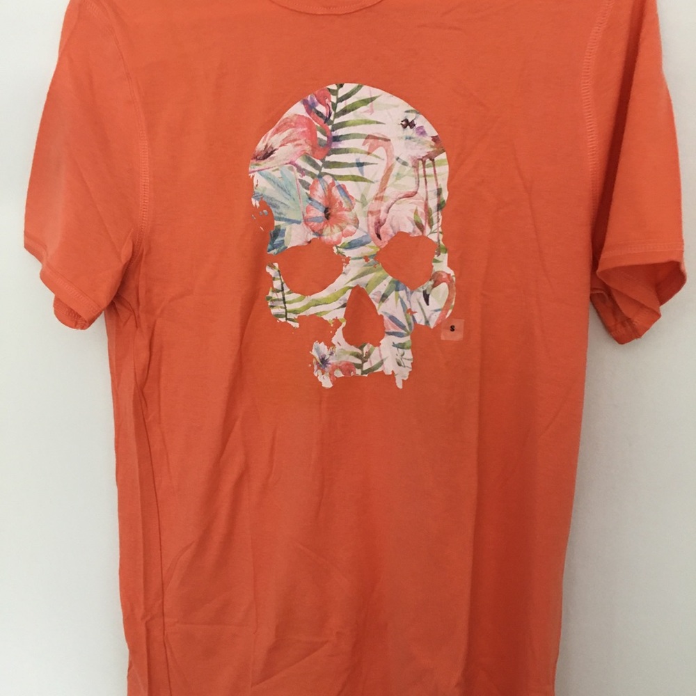 Orange shirt with skull in the middle